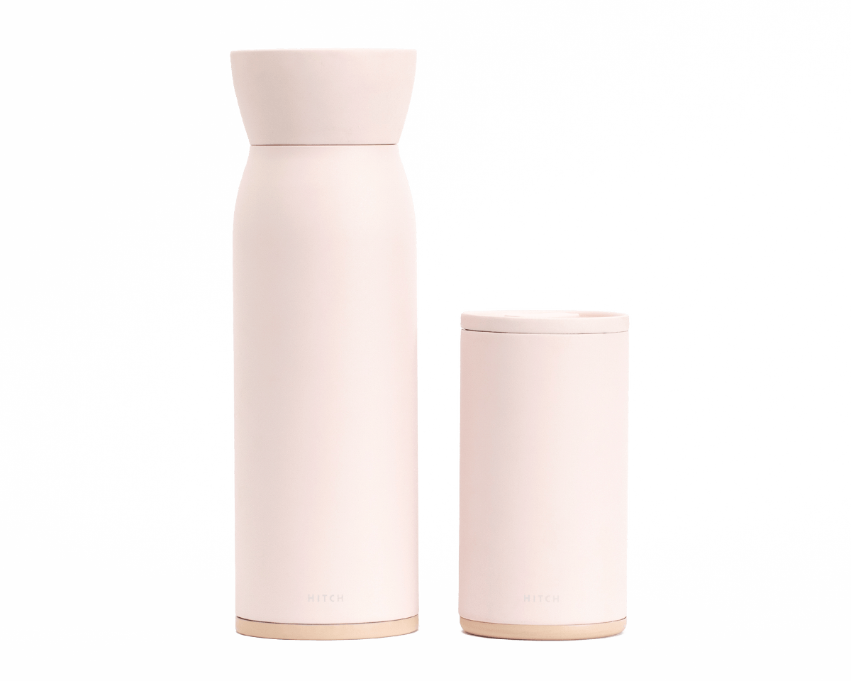 Hitch Bottle and Cup in Pale Blush, 18 oz Hitch Bottle and 12 oz Hitch cup are standing side by side