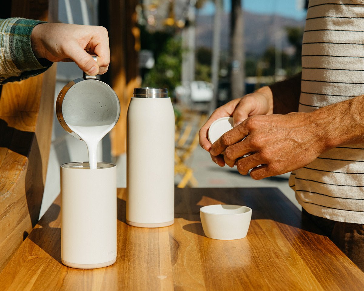 Steamed milk poured into 12 oz stainless steel barista approved Hitch Cup